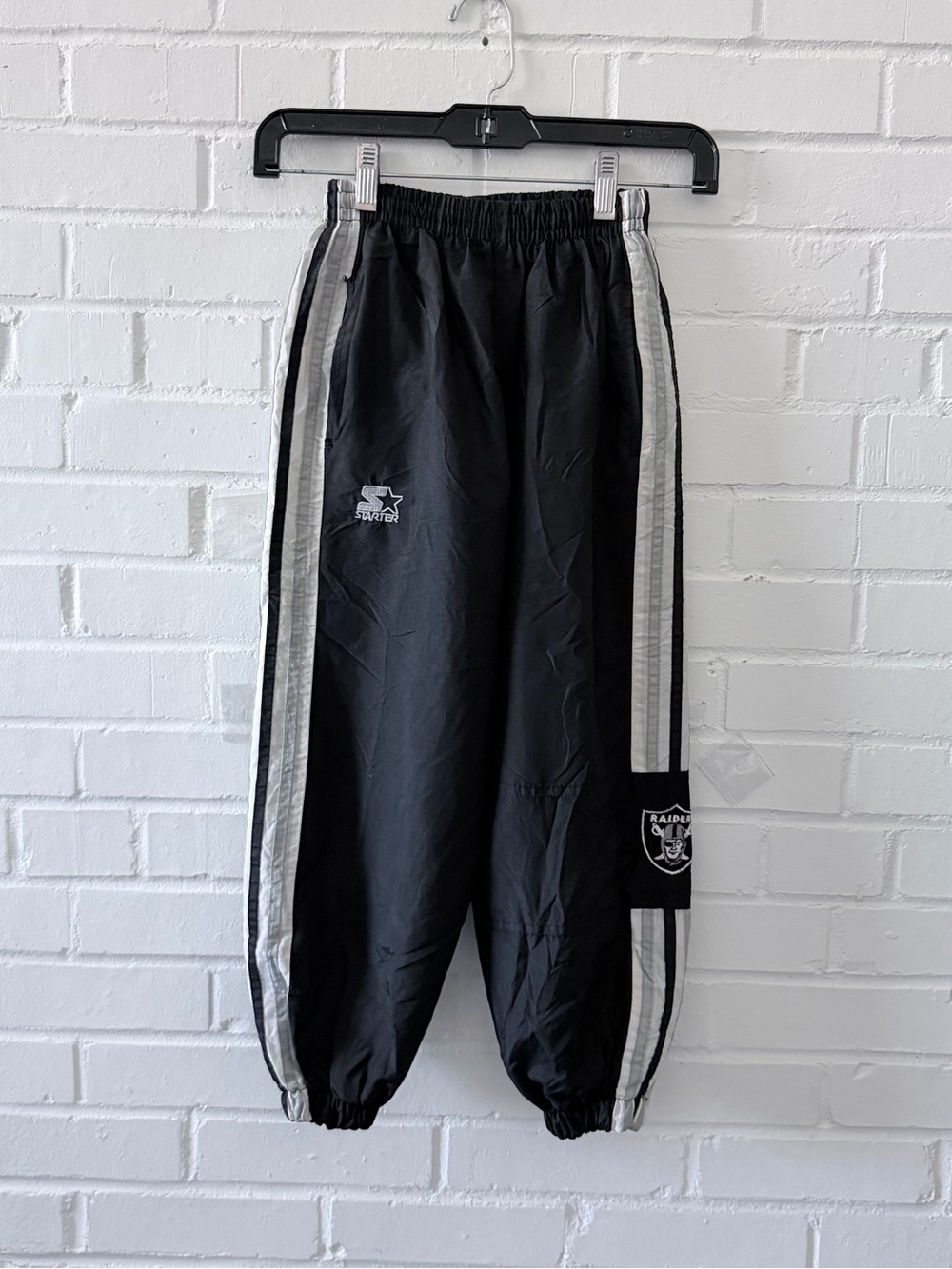 Vintage 90s Starter Raiders Track Pants Youth Small 8-10 Black Nylon NFL Kids